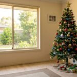 Decorated artificial Christmas tree in an Australian living room
