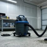 Wet and dry vacuum being used on a concrete laundry floor