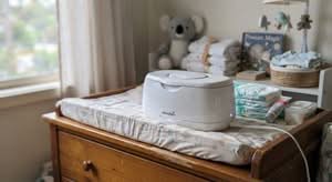 A close-up, candid smartphone photo of a baby wipe warmer, a popular product in Australia.