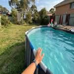 A sparkling above-ground pool in an Australian backyard, representing the best above ground pools australia.