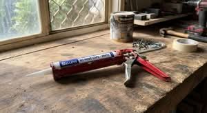 A top-rated caulking gun, the best caulking gun Australia has to offer, shown in a realistic setting.