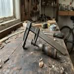 Close-up of the best clamps available in Australia, showcasing their sturdy design on a workbench.