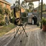 A popular camping chair in an Australian backyard setting, representing the best camping chairs Australia has to offer.