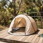 Unbranded pop-up beach tent set up for testing in a sunny Australian backyard.