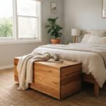 A stylish timber blanket box in a sunlit Australian bedroom representing the best blanket box australia options.